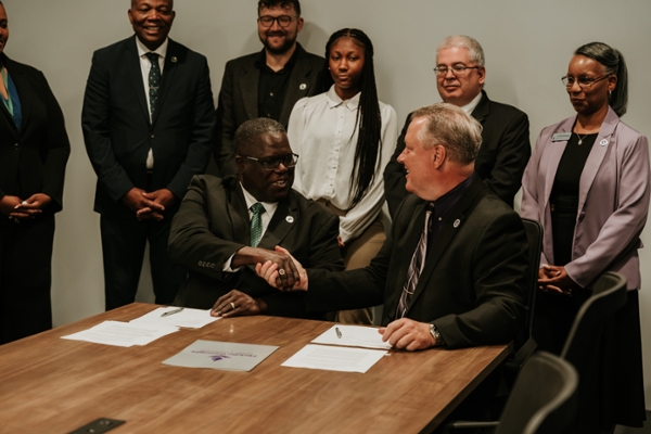 Dublin City School District Superintendent Dr. Frederick Williams and MGA Provost Vice President of Academic Affairs Dr. David Jenks sign the Dual Enrollment Articulation Agreement.